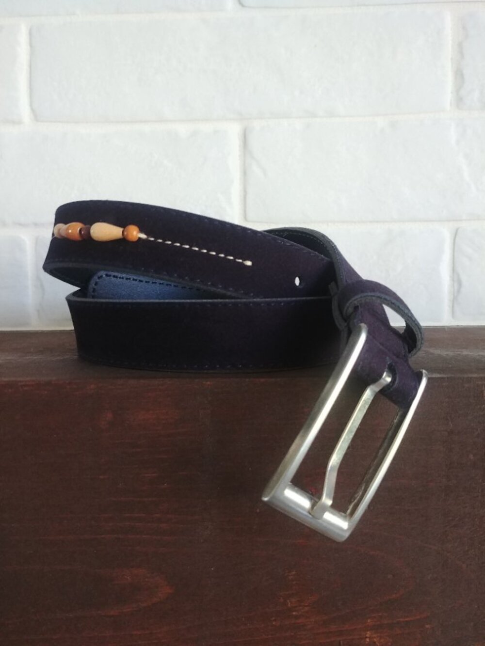 Dark navy blue suede feel belt with wooden bead detail rectangular buckl…